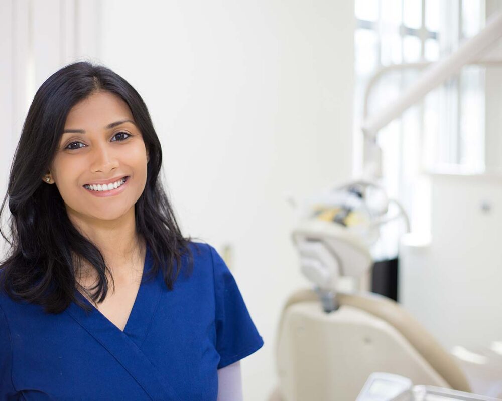 Dental nurse professional smiling before botox training course